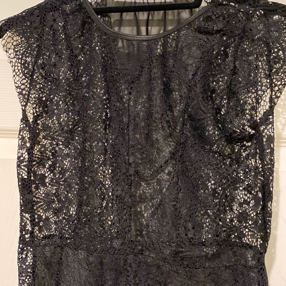 Beautiful black lace overlay bodysuit with snap crotch. No tags size Sm/Med